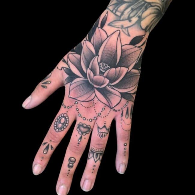 Lotus Flower Hand Tattoo