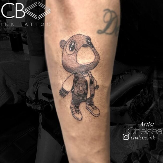 Chelsea Tattoo Artist Kanye West Graduation Teddy Bear Black and White Calf Music Tattoo