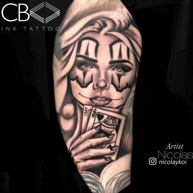 Nicolas Tattoo Artist Traditional Black and Grey Girl HEad Girl Holding Playing Cards Smile Face Marks Book Arm Sleeve Tattoo