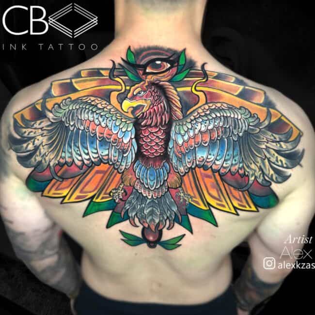 Alex Tattoo Artist Neo Traditional Colour Hawk With Colourful Sharp Background Patterns and Eye Above Back Tattoo