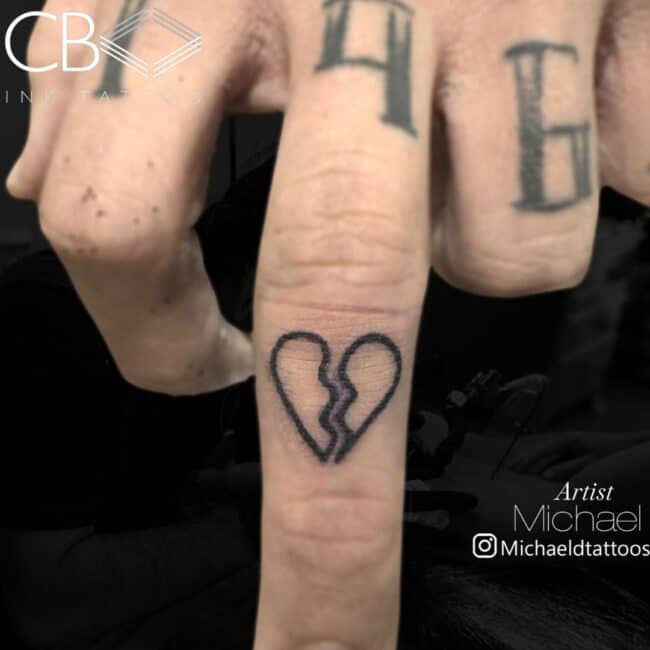 Michael Tattoo Artist Fine Line Broken Heart Two Pieces Crack in the Middle Hand Finger Tattoo