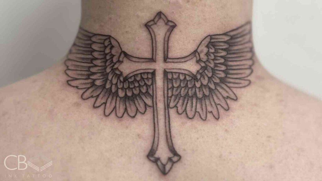 Neck Tattoos in Brisbane Bold Ink Trends for 2025 Uly Tattoo Artist Traditional Black and Grey Cross with Detailed Angel Wings Neck Tattoo Blog Cover Image