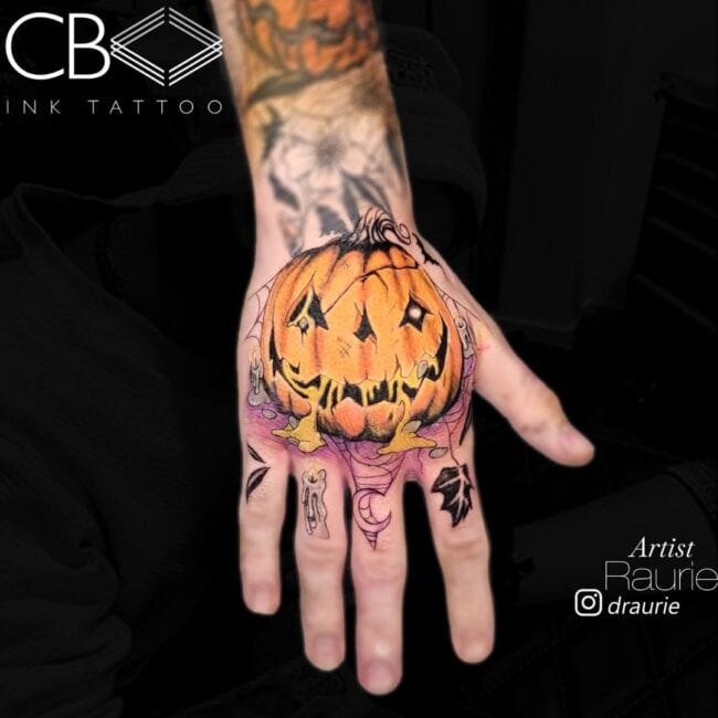 Raurie Tattoo Artist Colour Realism Pumpkin Jack-O’-Lantern Yellow Sap One Eye Shadow Hand Tattoo