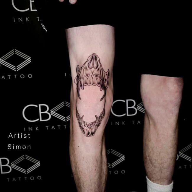 Simon Tattoo Artist Realism Black and Grey Vampire Skull Open Jaw Long Sharp Teeth Leg Knee Tattoo