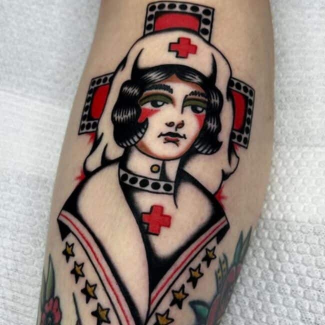 Classic Traditional Nurse Stars Red Cross Emblem Bold Lines Forearm Tattoo