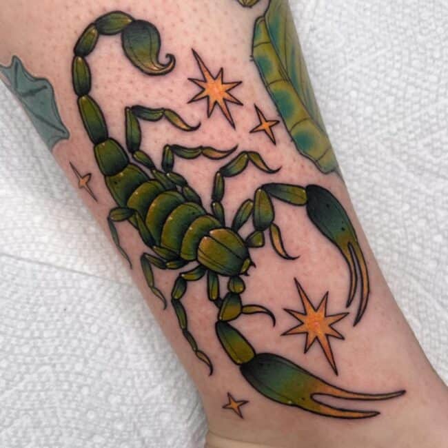 Colour Full Body Green Scorpion with Yellow Stars Around It Zodiac Sign Forearm Tattoo