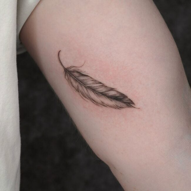 Fine Line Minimalist Detailed Feather Arm Tattoo