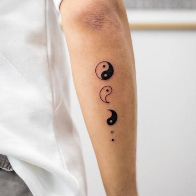 Fine Line Minimalist Yin-Yang Forearm Tattoo