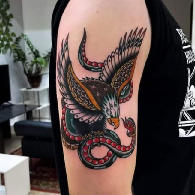 Traditional Colour Eagle Outstretched Wings Snake Forked Tongue Fighting Arm Tattoo