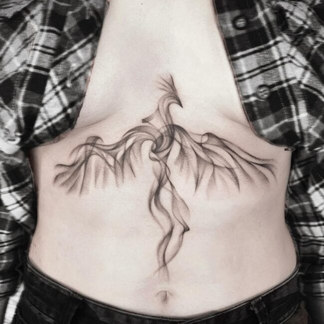 Black and Grey Minimalist Phoenix Pointed Beak Crest Wing Designed to Resemble Smoke Belly Sternum Tattoo