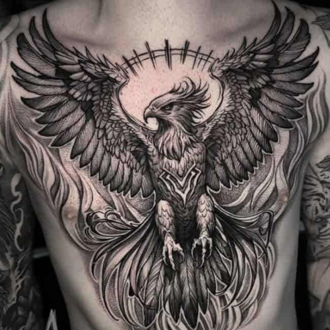 Black and Grey Realism Whole Body Phoenix Pointed Beak Eye Crest Outstretched Wings Tail Sharp Talons Nails Leg Feet Detailed Feathers Shoulder Chest Sternum Belly Tattoo