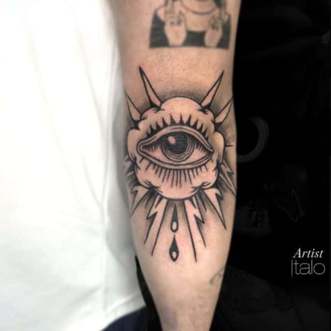 Italo Tattoo Artist Realism Black and Grey Detailed All Seeing Eye Sharp Elements Eyebrow Sharp Elements Elbow Arm Tattoo