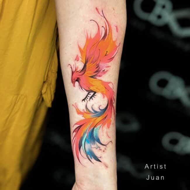 Juan Tattoo Artist Watercolour Cartoon Full Body Phoenix Wings Tail Feathers Crest Talons Feet Sharp Curved Beak Forearm Tattoo