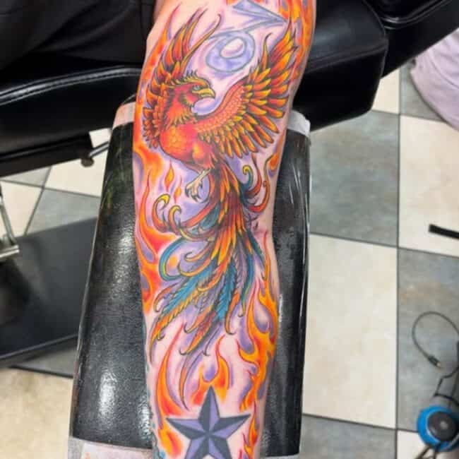 Neo Traditional Colour Whole Body Phoenix Pointed Beak Glowing Eye Crest Wings Tail Sharp Talons Nails Flames Big Star Arm Sleeve Tattoo