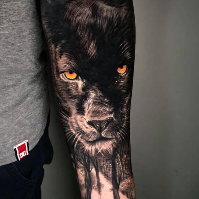 Realism Blackwork Panther Glowing Eyes Whiskers Nose Trees Leaves Grass Forest Arm Sleeve Tattoo