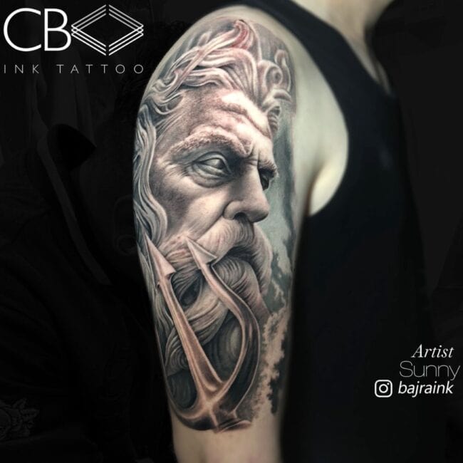 Sunny Tattoo Artist Black and Grey Realism Portrait Poseidon Holding Trident Three Pronged Spear Face Mustache Beard Upper Arm Tattoo