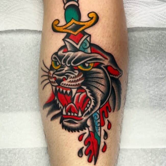 Traditional Colour Portrait Panther Dagger Piercing Head Bloody Detailed Whiskers Sharp Tooth Fierce Eye Ears Arm Forearm Tattoo
