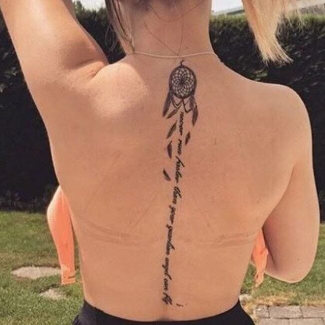 Black and Grey Script Lettering Realism Dreamcatcher Leaves Mantras Quotes Sanskrit Vertical Letters Cursive Spine Back Tattoo